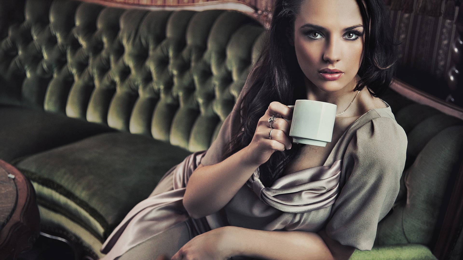 Stylish lady drinks coffee
